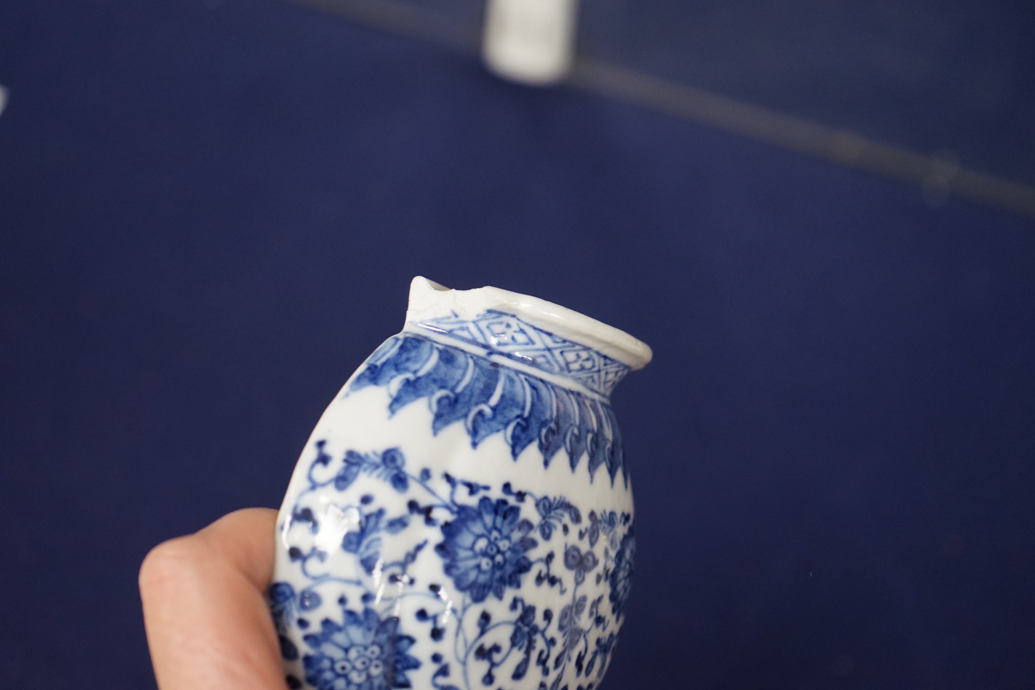 A Chinese blue and white wall vase shaped pocket, 19th century, 16.5cm tall